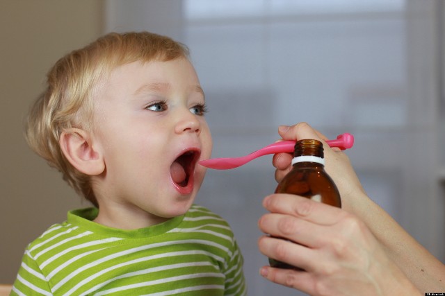 Mother giving 2 years old baby boy medicine, cough syrup on a spoon. Sick child.; Shutterstock ID 65331178; PO: The Huffington Post; Job: The Huffington Post; Client: The Huffington Post; Other: The Huffington Post